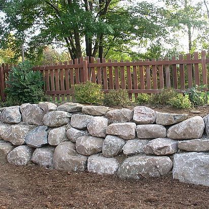 How to Create a Retaining Wall with River Rocks or Stones - Tigard Sand &  Gravel LLC